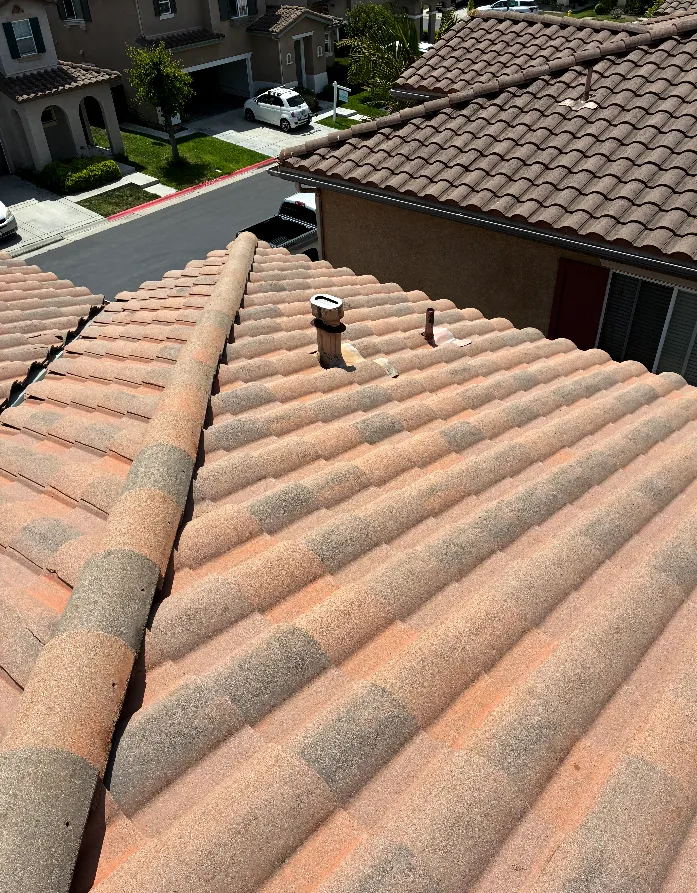 Spanish tile roof in Ventura County after a soft wash, with no moss or black streaks